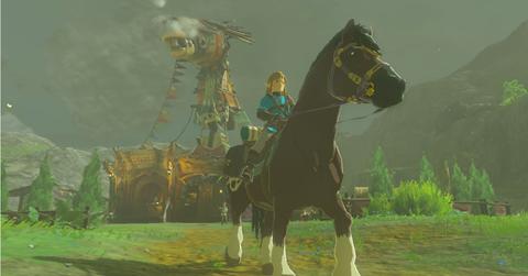 'Tears of the Kingdom' Link leaving a stable on horseback.