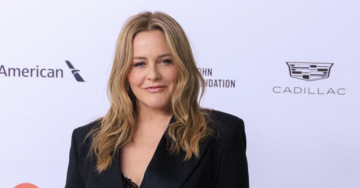 Alicia Silverstone posing for a press photo