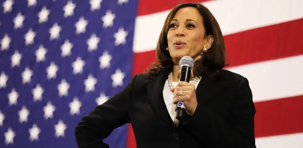 Kamala Harris in front of an American flag