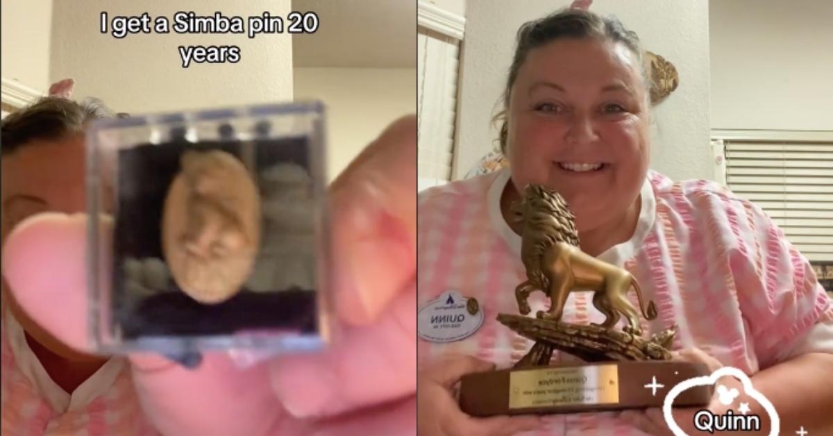 Quinn shows off her Simba pin and statue