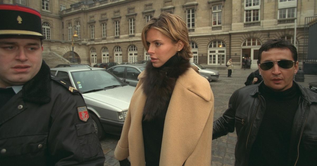 Kelly Fisher being escorted to be heard by Judge Herve Stepfan in 1998.