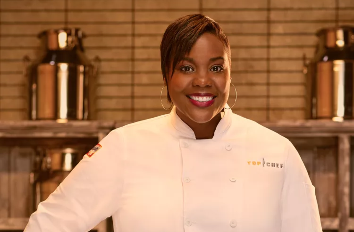 Michelle wears a white chef's jacket for her official 'Top Chef: Wisconsin' portrait.