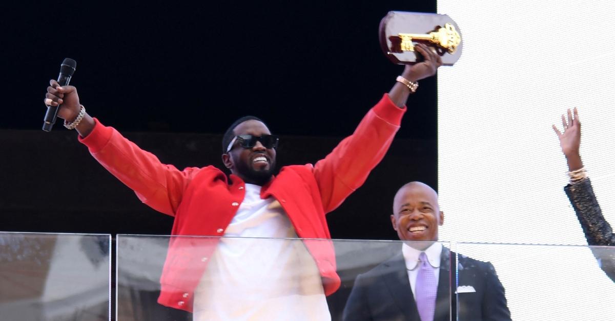 (l-r): Sean "P.Diddy" Combs holding the key to the city with Mayor Eric Adams