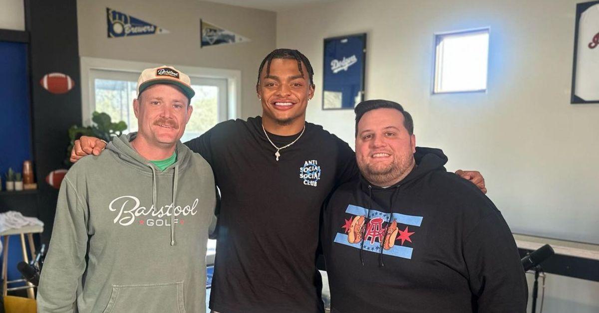 (l-r): Barstool Carl, Justn Fields, and Eddie Barstool embracing 