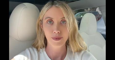 Laura Clery sitting in her car.