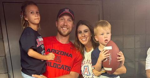 Nick and Tori Foles holding their kids in Arizona.