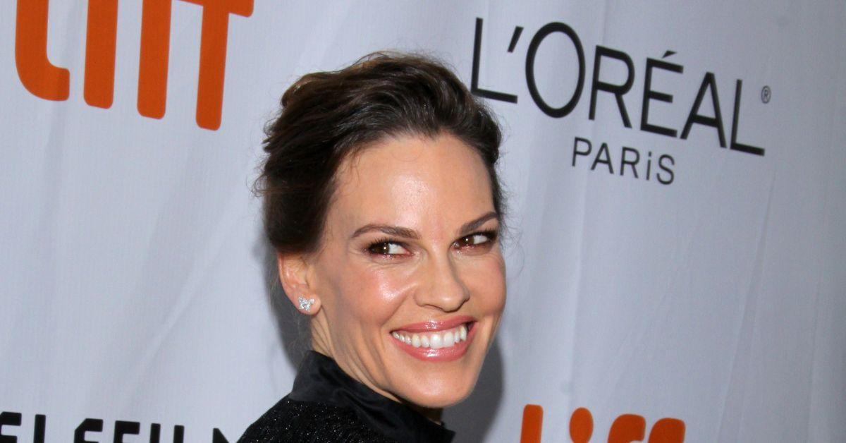 Hilary Swank attending a red carpet event.