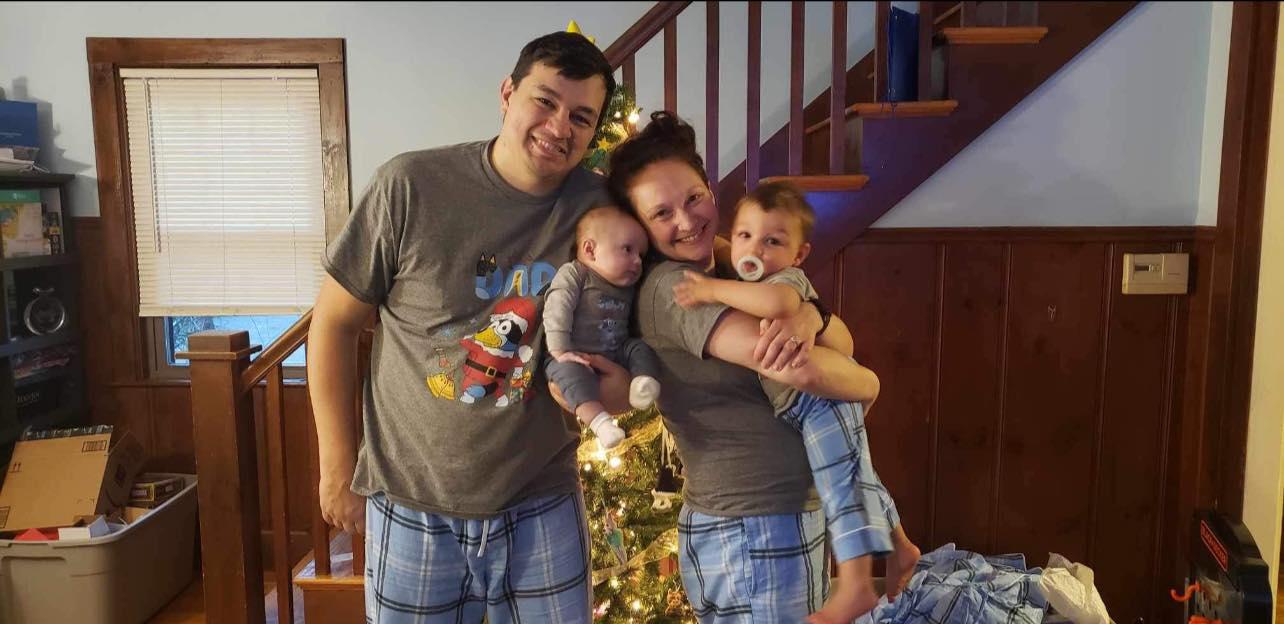 Shane and Ashley Sherwood celebrating Christmas with their sons Sylis and Swayman.