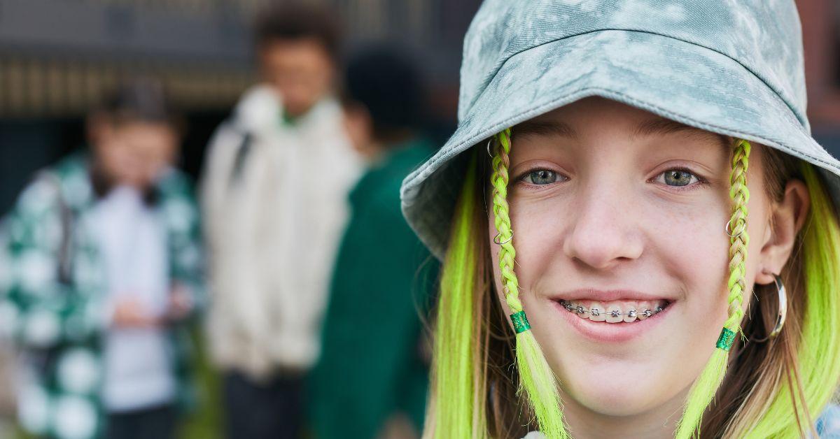 Generation Alpha girl with green hair