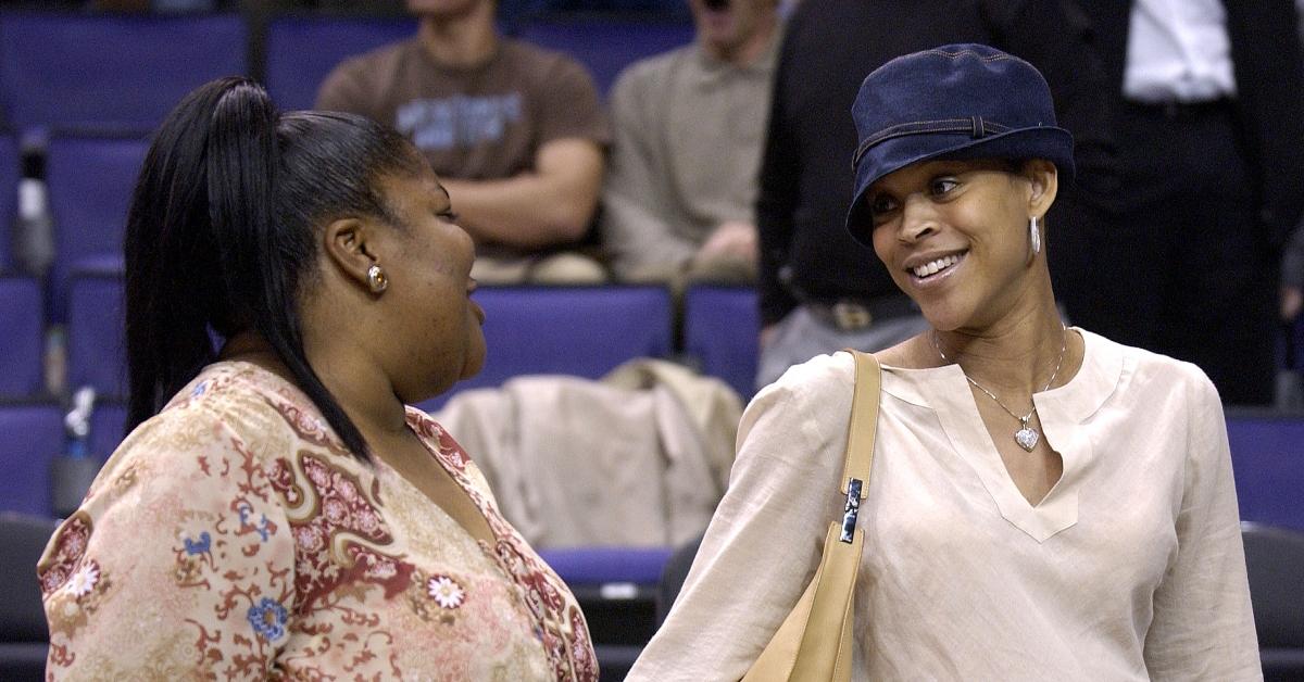 Shaunie O'Neal chats with actress Monique courtside at a Lakers game