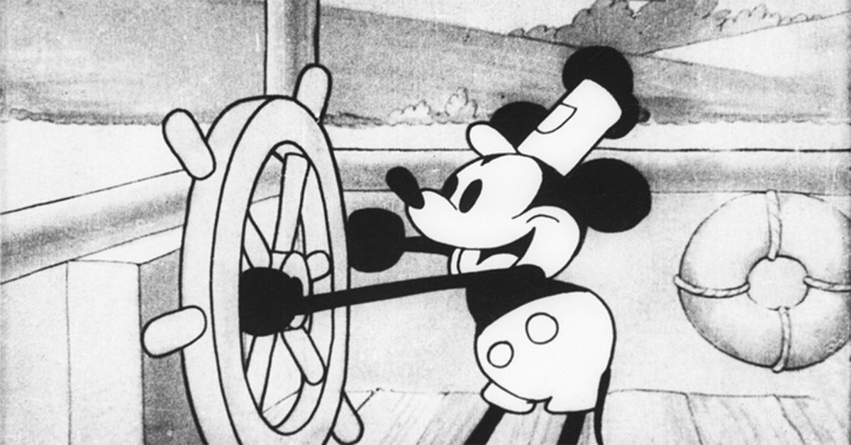 Steamboat Willie steering his ship.