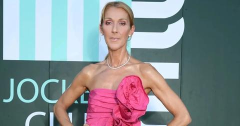 Celine Dion attends an event wearing a pink dress.