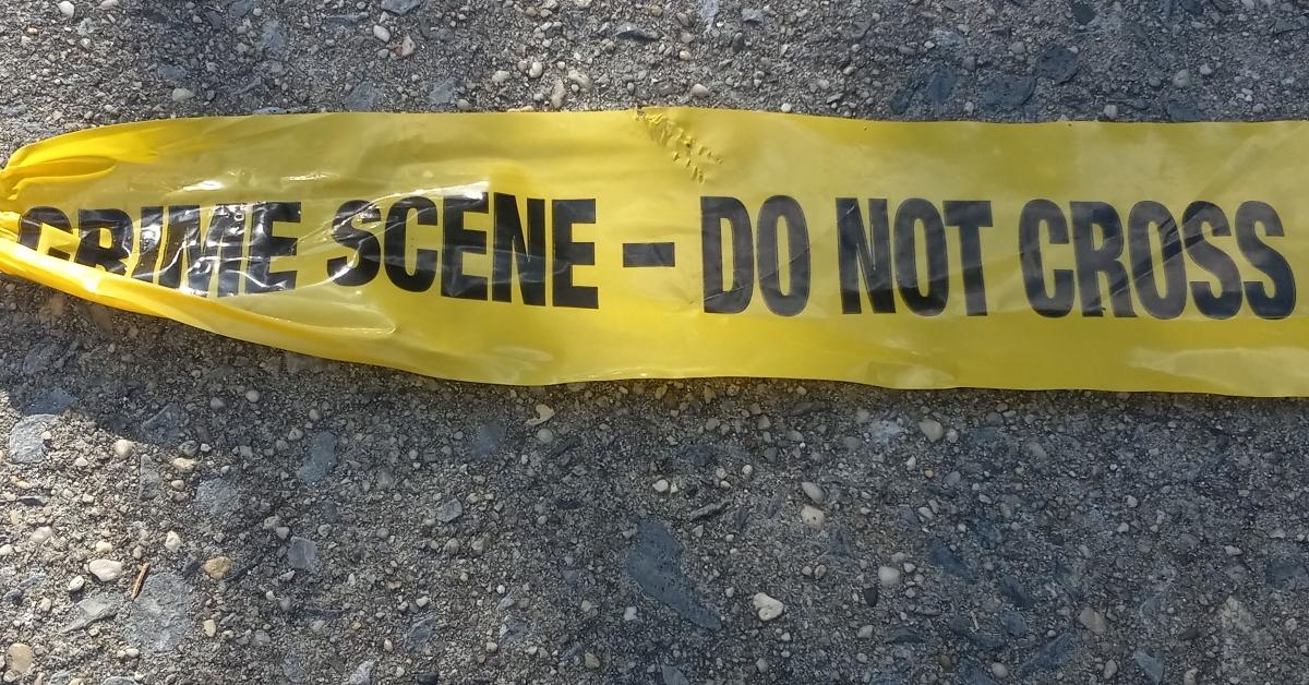 Image of crime scene tape on the ground