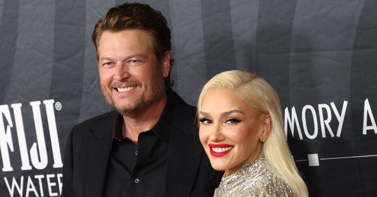 Gwen Stefani and Blake Shelton at a red carpet event.