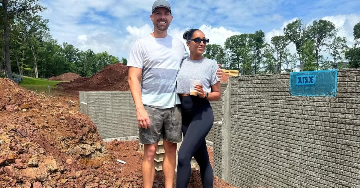 Monica and Zac on the site of their new house.