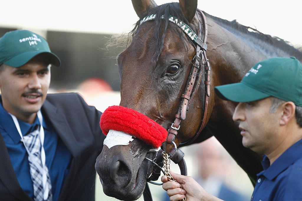 Kentucky Derby horse with handlers