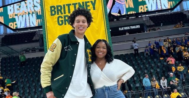 Brittany Griner and her wife, Cherelle at a stadium.