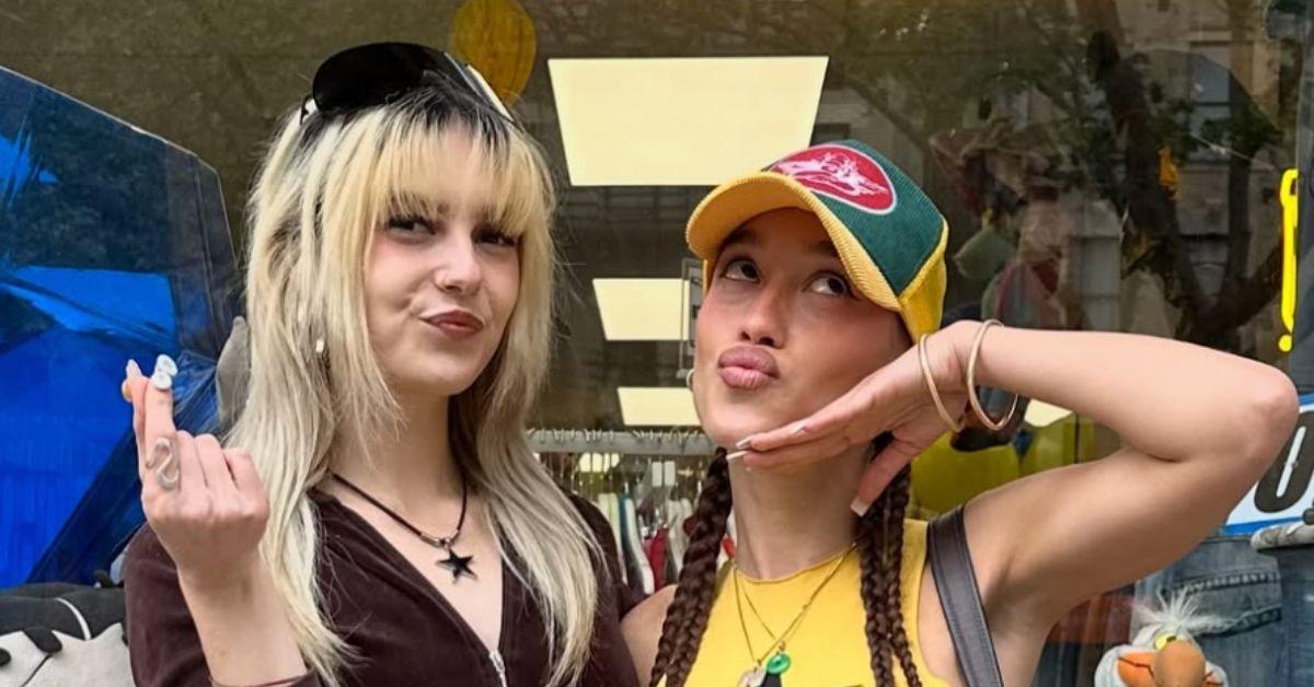 Nezza with a friend outside a boutique. 