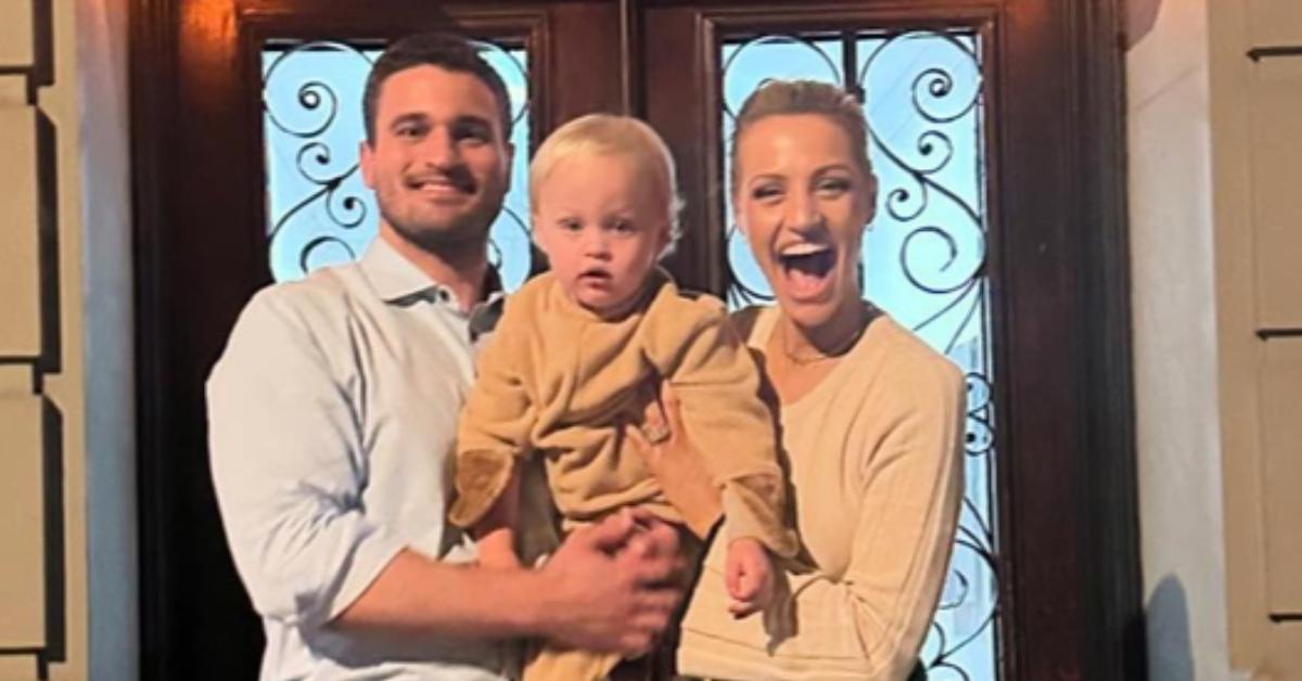 Carley Shimkus and her husband Peter, both holding their son Brock.