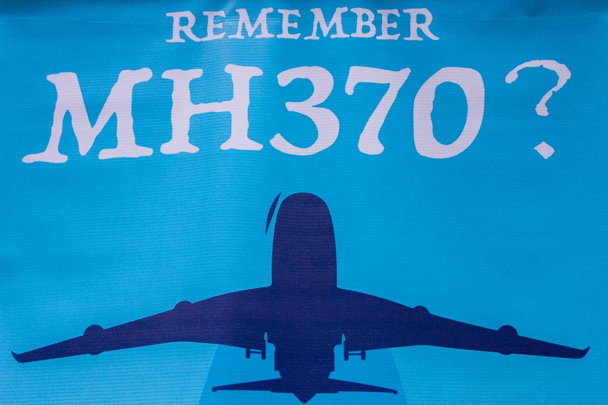 PUBLIKA, KUALA LUMPUR, KL, MALAYSIA - 2018/03/03: A MH370 poster seen at the 4th Annual MH370 Remembrance event. Hundreds of people had gathered at the Remember MH370? Its Not History, Its Our Future is the 4th Annual MH370 Remembrance event organised by VOICE370 the MH370 Family Support Group held at Publika, Kuala Lumpur on 3rd March 2018. The purpose of the event is to gather the people to stand in solidarity and commemorate 4 years since tragedy of MH370 disappeared from the blue sky with the loss of 239 lives on 8th March 2014. (Photo by Faris Hadziq/SOPA Images/LightRocket via Getty Images)