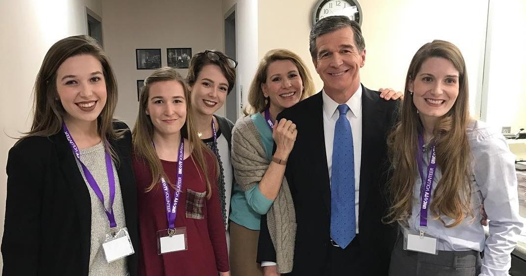 Roy Cooper with his wife and daughters.