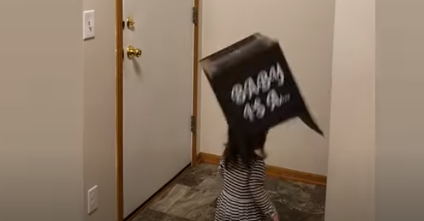 box falling on kids head