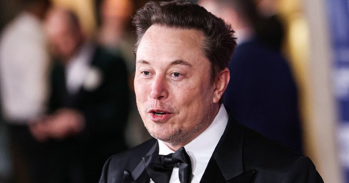 Elon Musk pursing his lips