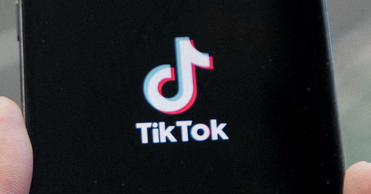 A TikTok logo on a phone screen. 