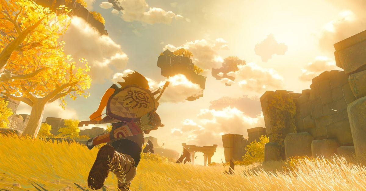 Link running across a field in TotK.