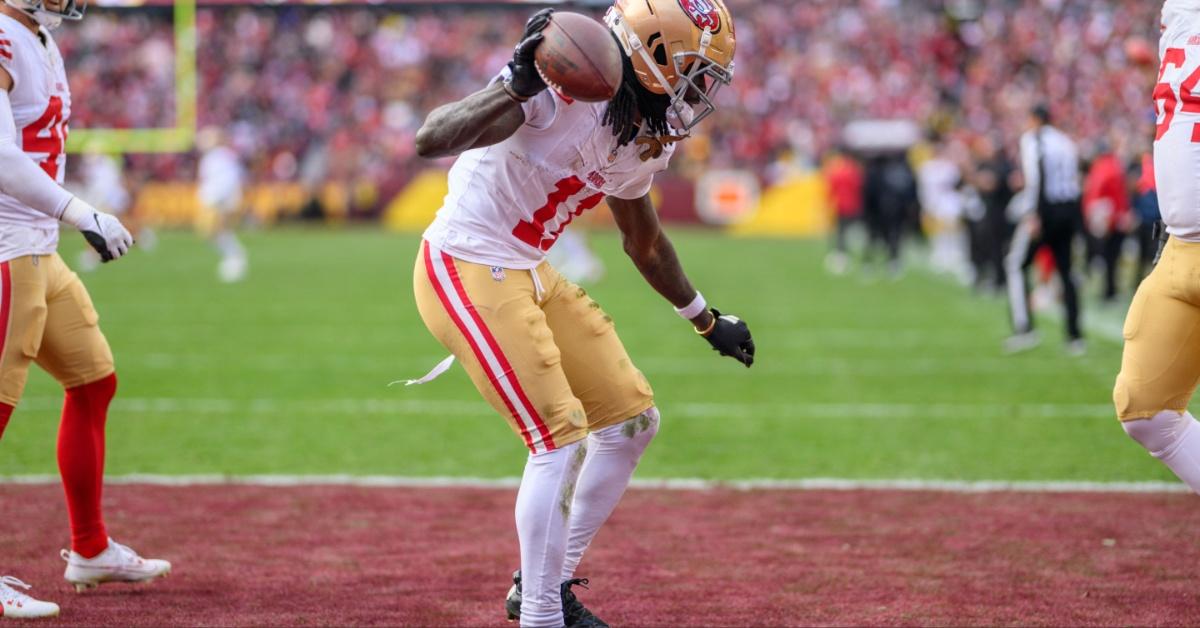 Brandon Aiyuk scores a touch down. 