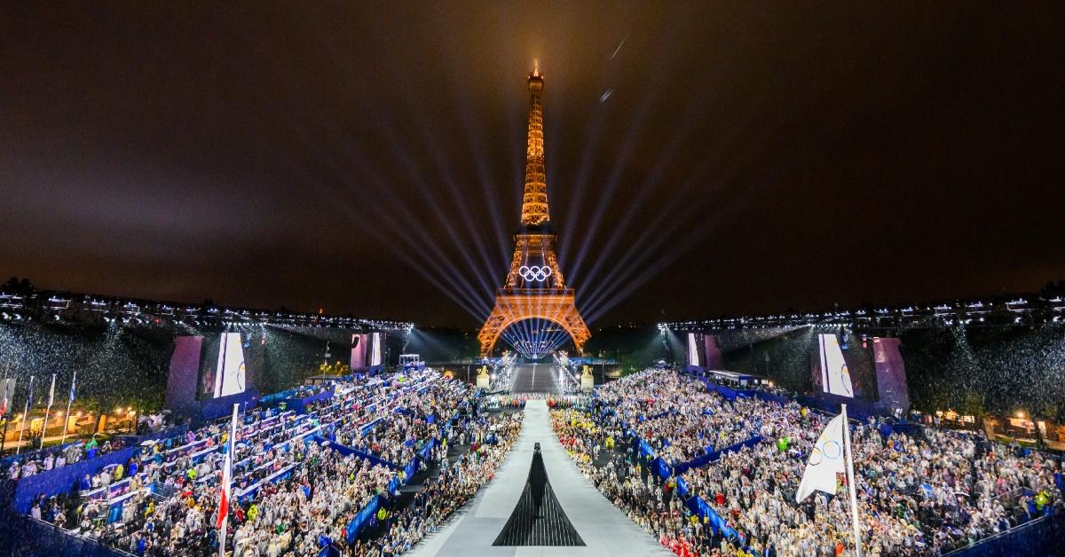 The Olympic flag is rasied at the Place du Trocadero in front of the Eiffel Tower.