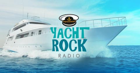 The logo for Yacht Rock Radio with a boat behind it.
