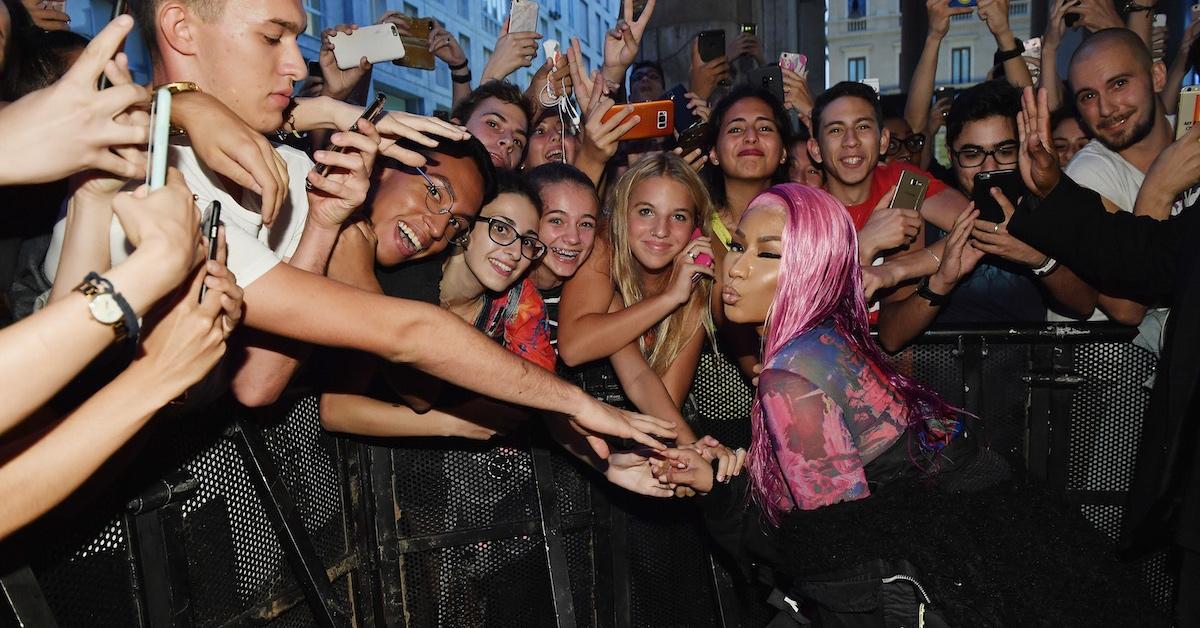 Nicki Minaj pictured with fans in Italy at a Diesel event