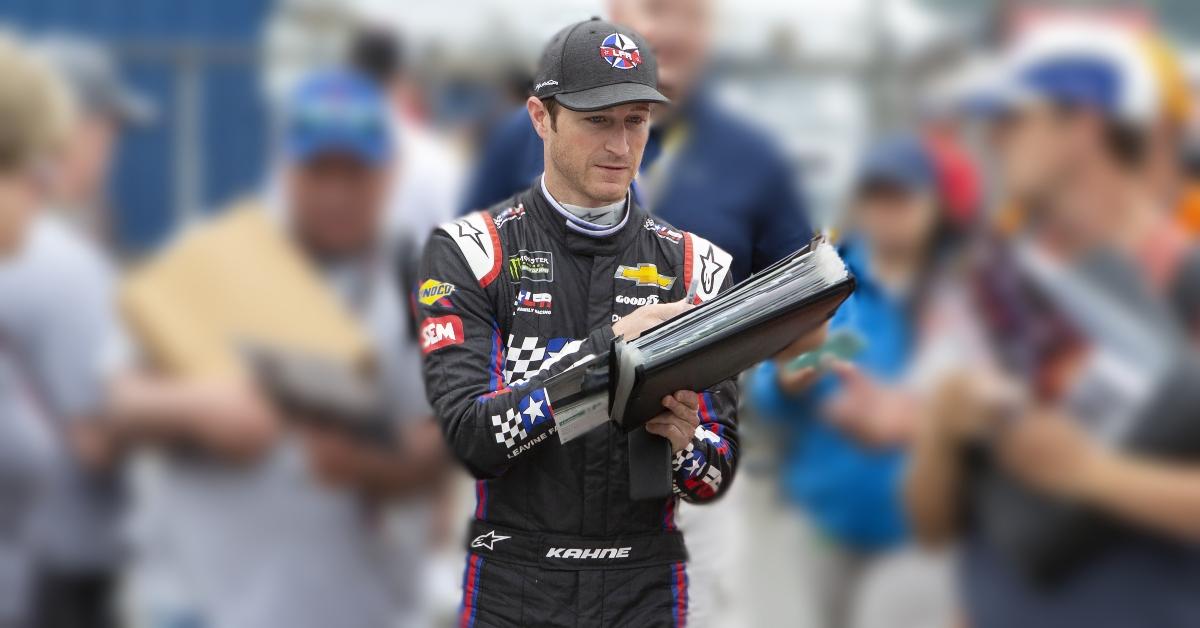 Kasey Kahne signs autographs for fans