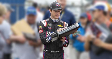 Kasey Kahne signs autographs for fans