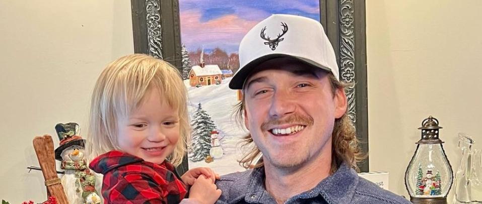 Morgan Wallen and his son Indigo posing for Christmas family photos. 