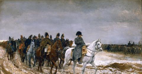 Napoleon riding a white horse with other troops