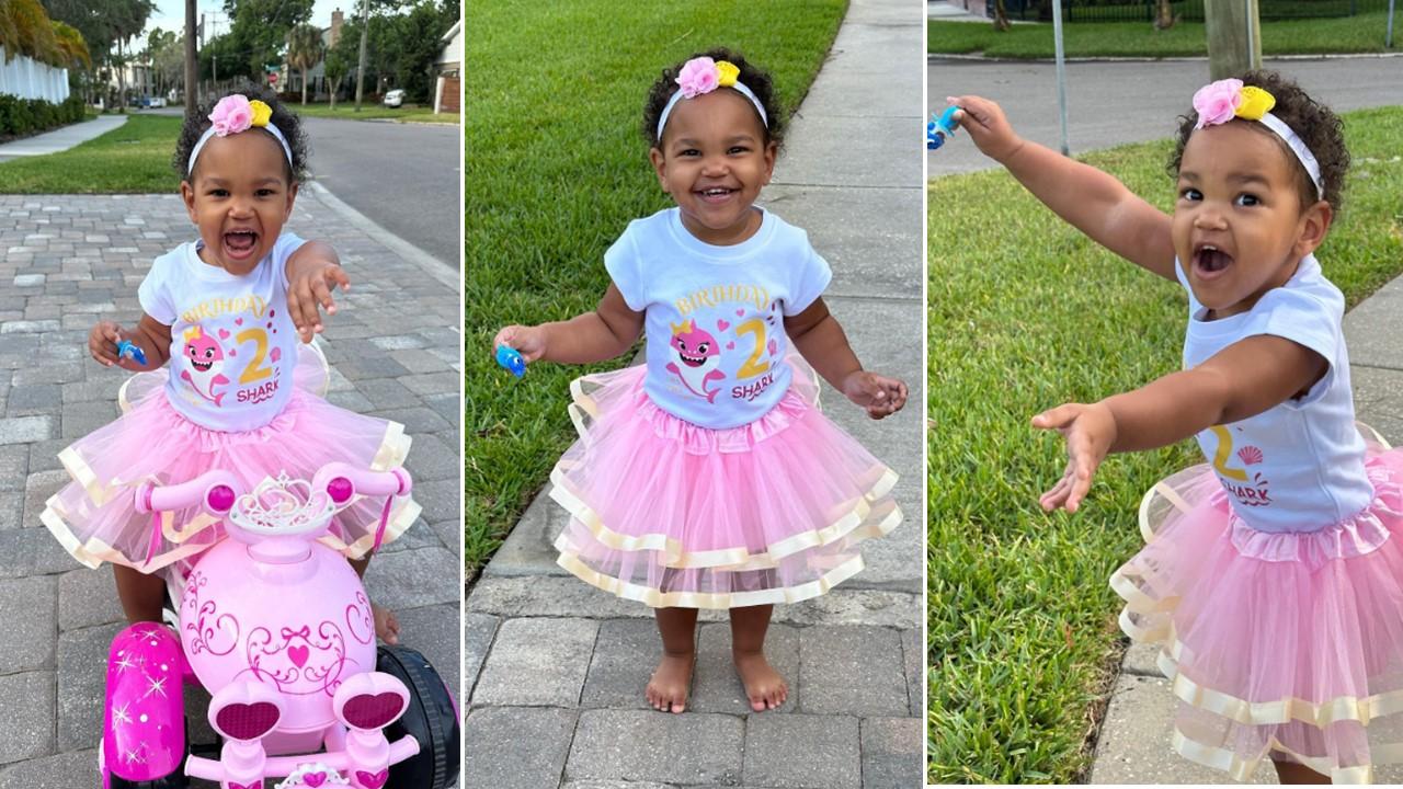 Arrayah Barrett in a pink tutu and Baby Shark shirt on her second birthday.