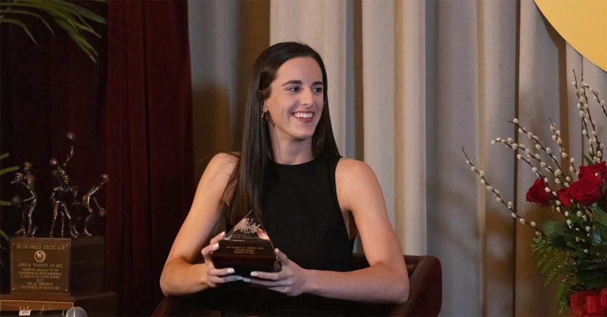 Caitlin Clark accepting an award in Los Angeles. 