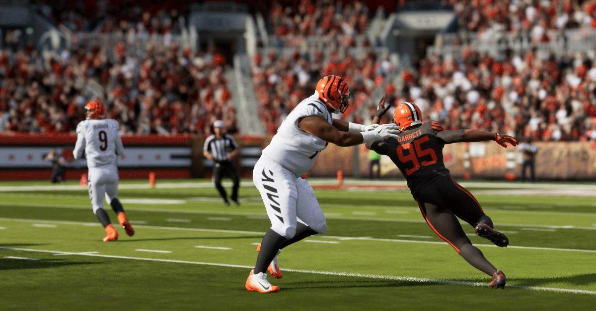 A Bengal's player blocking a Browns player in Madden 24.