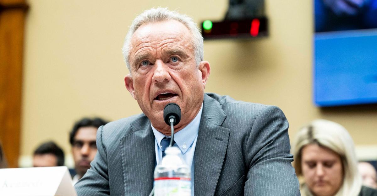 RFK Jr. speaks into a microphone