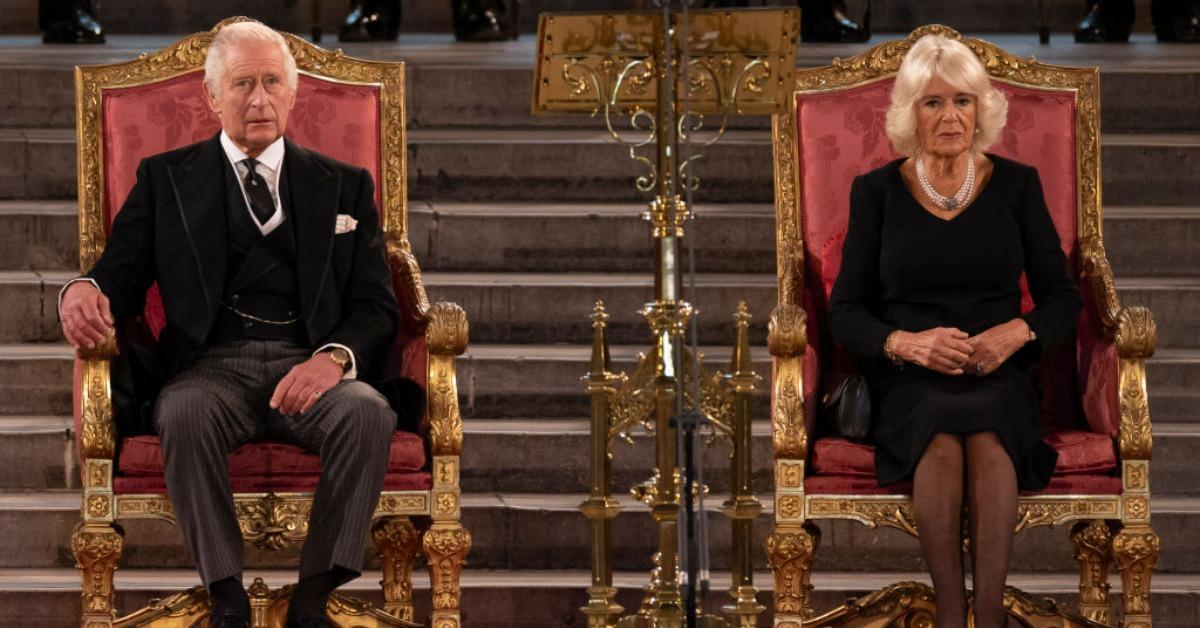 The Stone of Destiny is important to British royalty. King Charles III sitting with Camilla, Queen's Consort on thrones. 