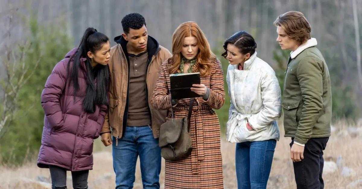 The cast of The CW's 'Nancy Drew' in the woods