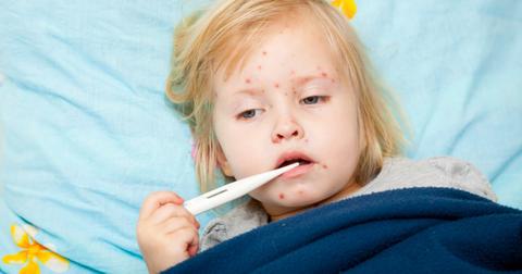 sick-girl-is-measuring-the-temperature-picture-id153576507-1535571466822-1535571468685.jpg