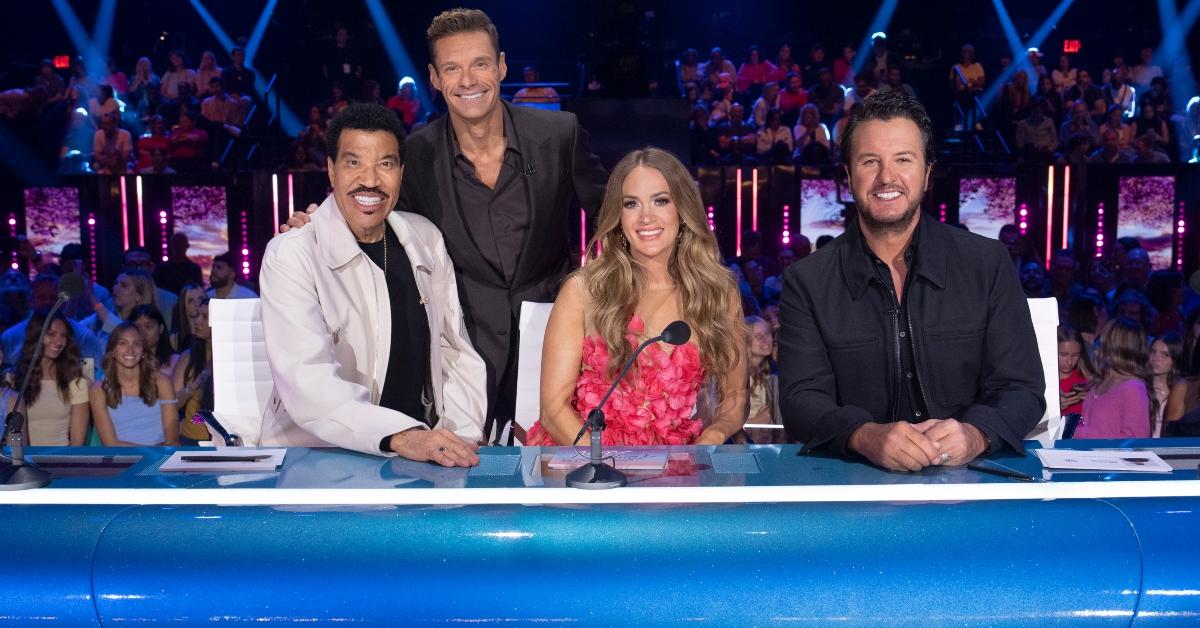 Ryabn Seacrest with the American Idol judges.