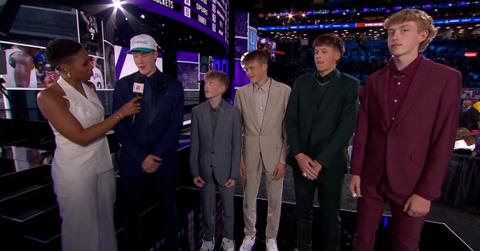 Kon Knueppel being interviewed alongside his brothers.