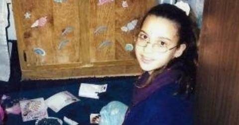 Kimberly Holton sits in her bedroom