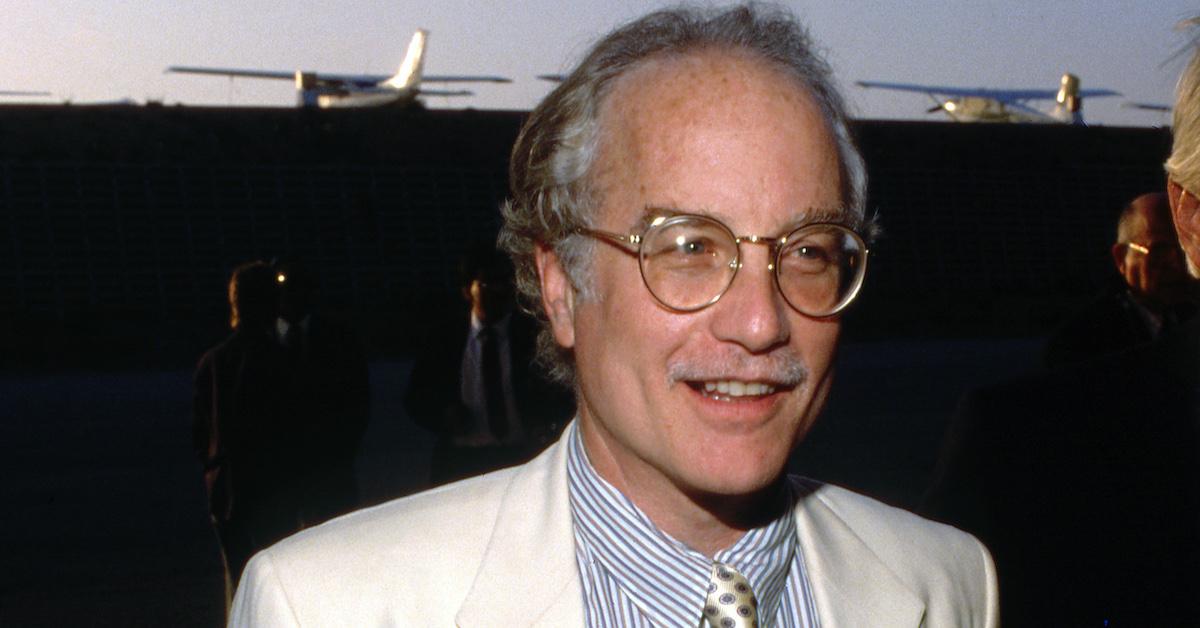 Richard Dreyfuss wearing coat and tie and glasses in 1980