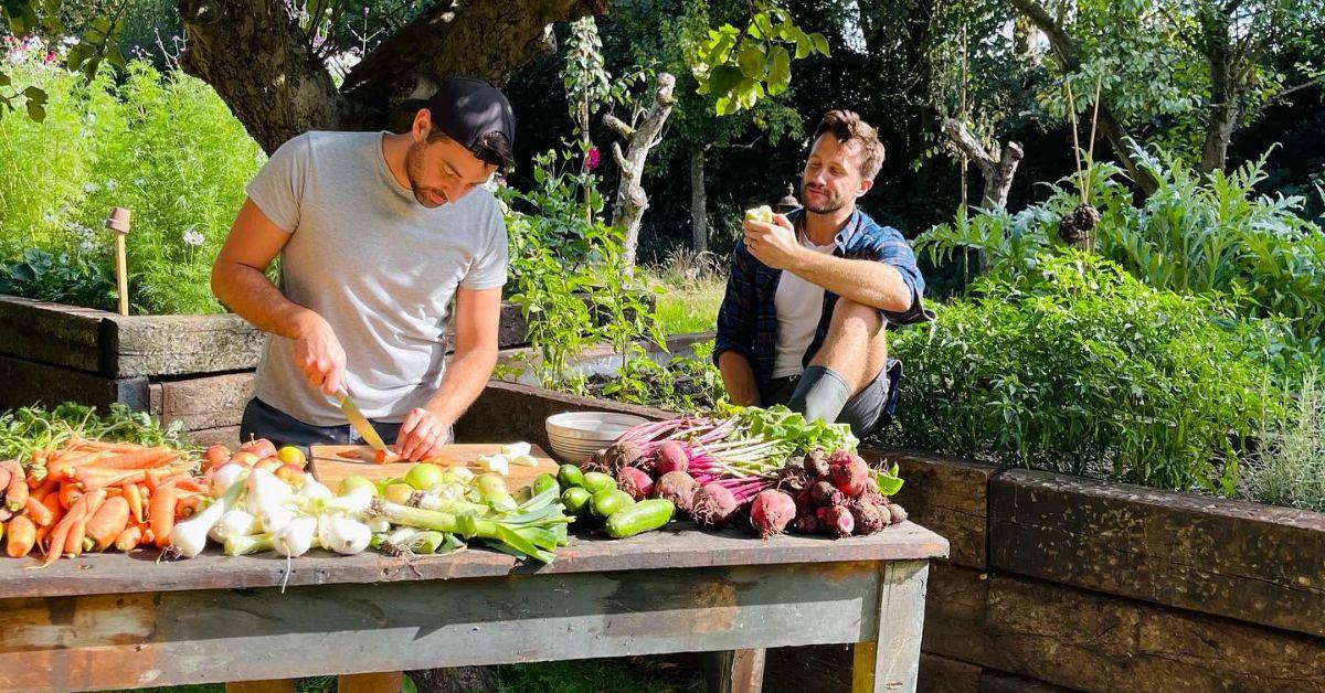 Borja De Maqua and Dean Poulton enjoying fruits and vegetables on their garden. 