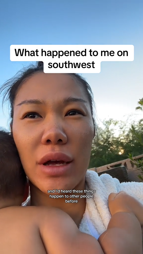 Kyli holding her baby and describing want happened on the Southwest flight